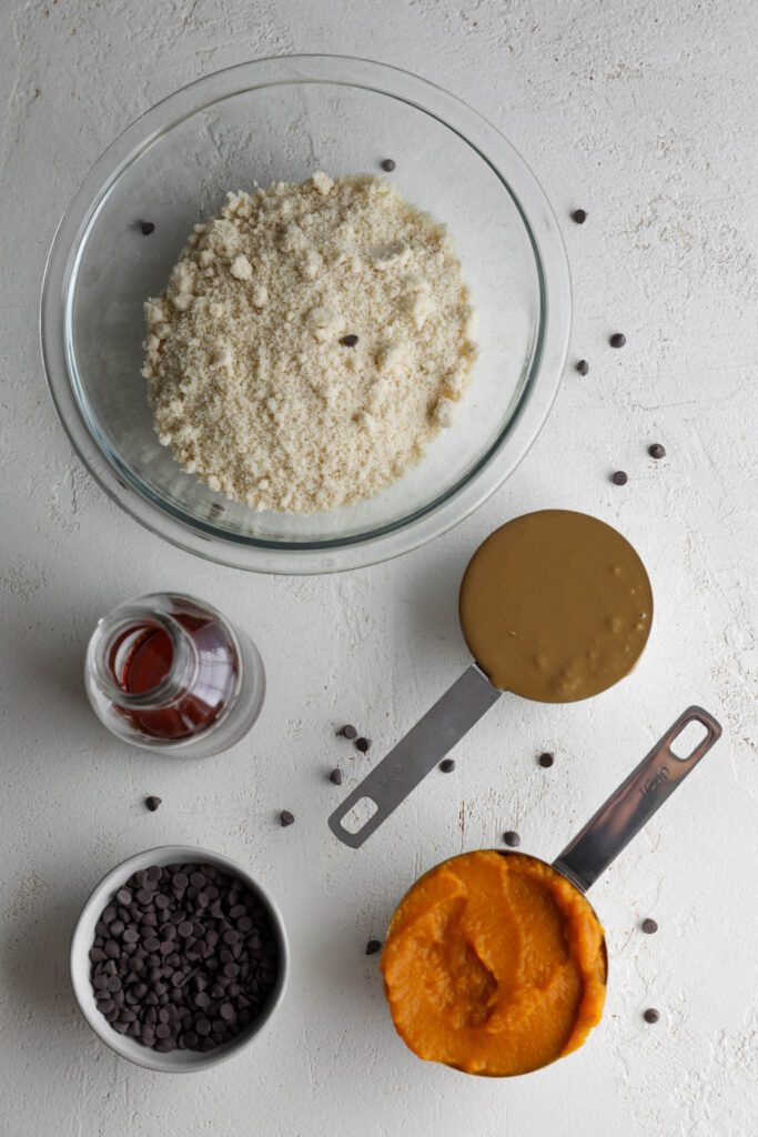 almond flour, SunButter, maple syrup, pumpkin, and chocolate chips on board by Flora & Vino