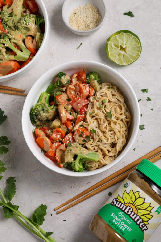 SunButter Ramen Noodle Bowls served in bowls with cilantro and sesame seeds and chopsticks by Flora & Vino