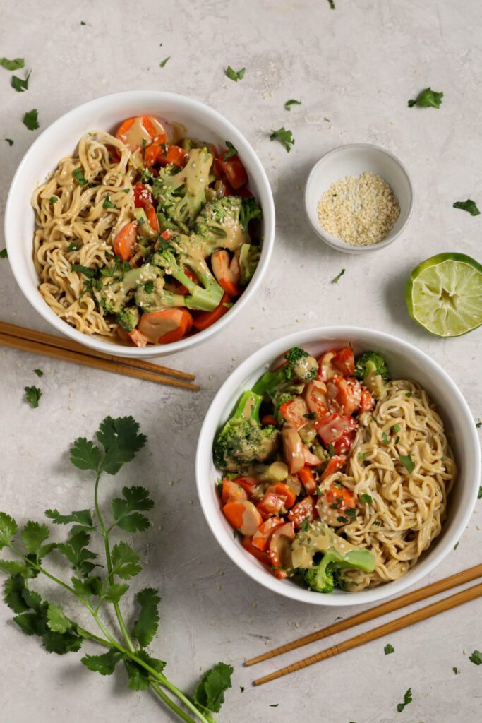 SunButter Ramen Noodle Bowls served in a bowls with cilantro and sesame seeds and chopsticks by Flora & Vino