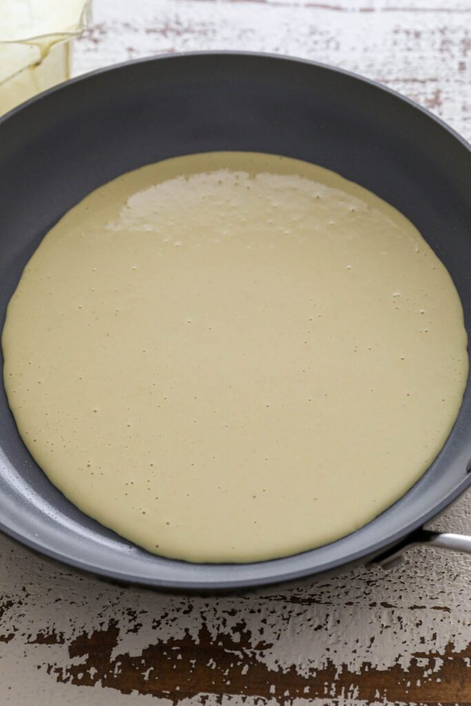 vegan omelette batter poured in pan 