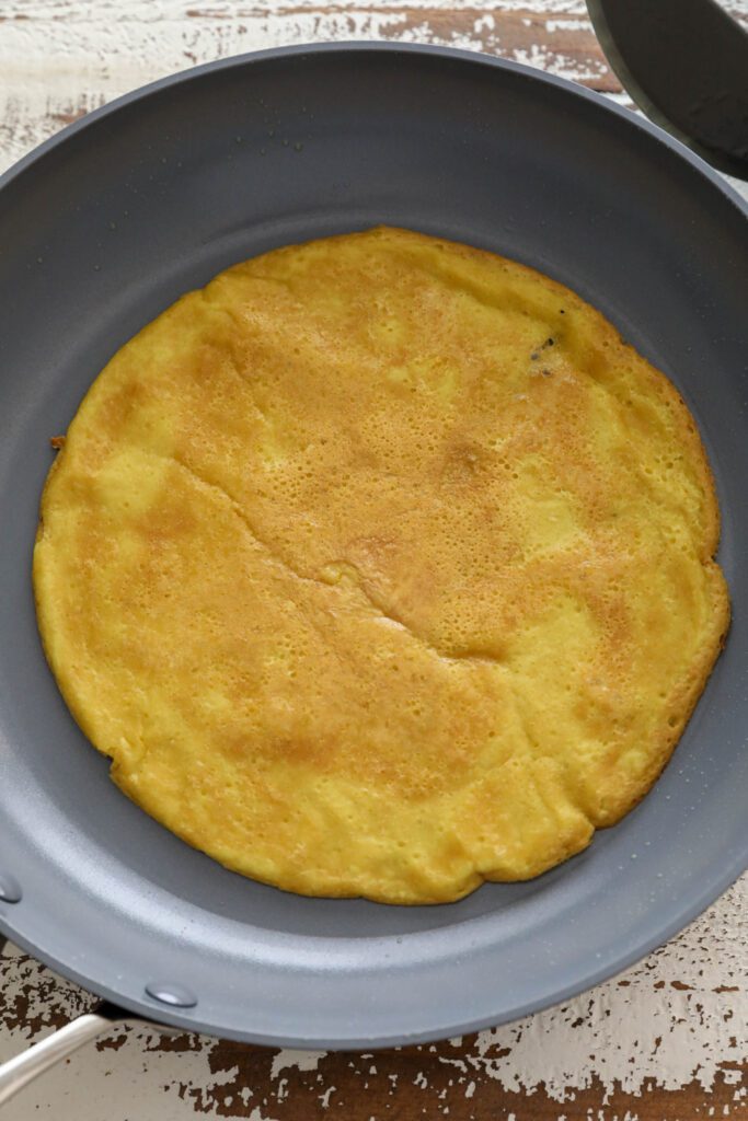 vegan omelette cooked in pan 