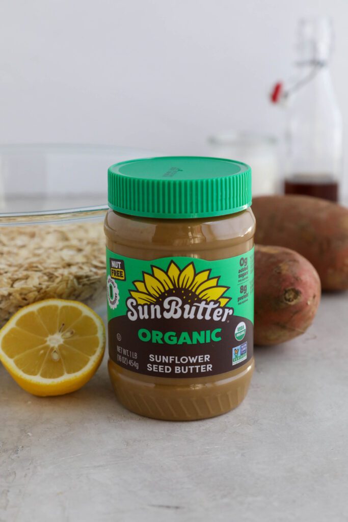 Organic SunButter on board with lemon, oats, sweet potato, almond milk, and maple syrup