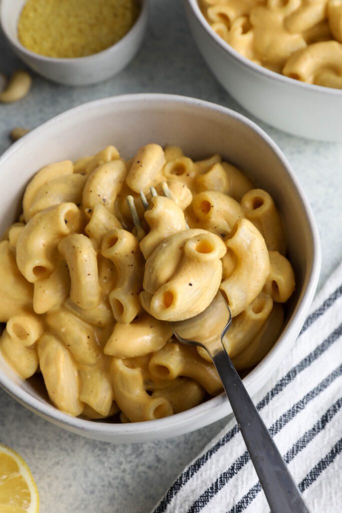 Butternut Squash Mac 'N' Cheese served in bowl with forks on side