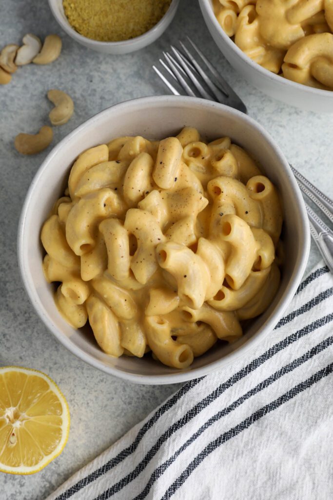 Butternut Squash Mac 'N' Cheese served in bowl with forks on side