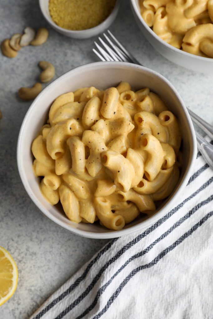 Butternut Squash Mac 'N' Cheese served in bowl with forks on side