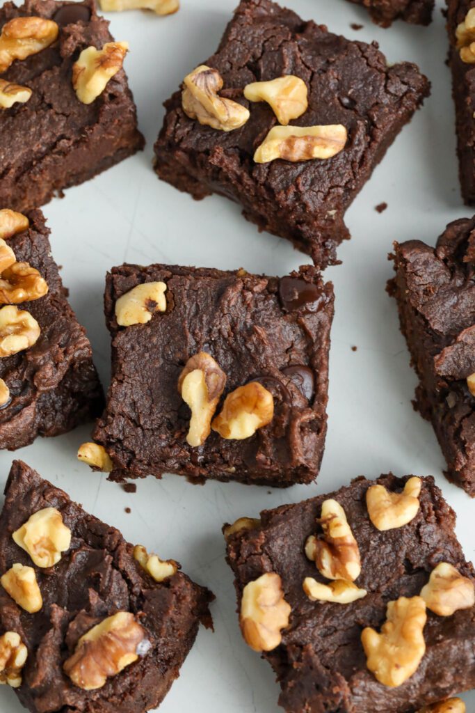 Red Bean Brownies topped with walnuts on white plate
