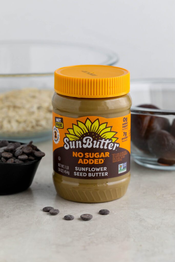SunButter jar surrounded by beets, chocolate chips, and oats
