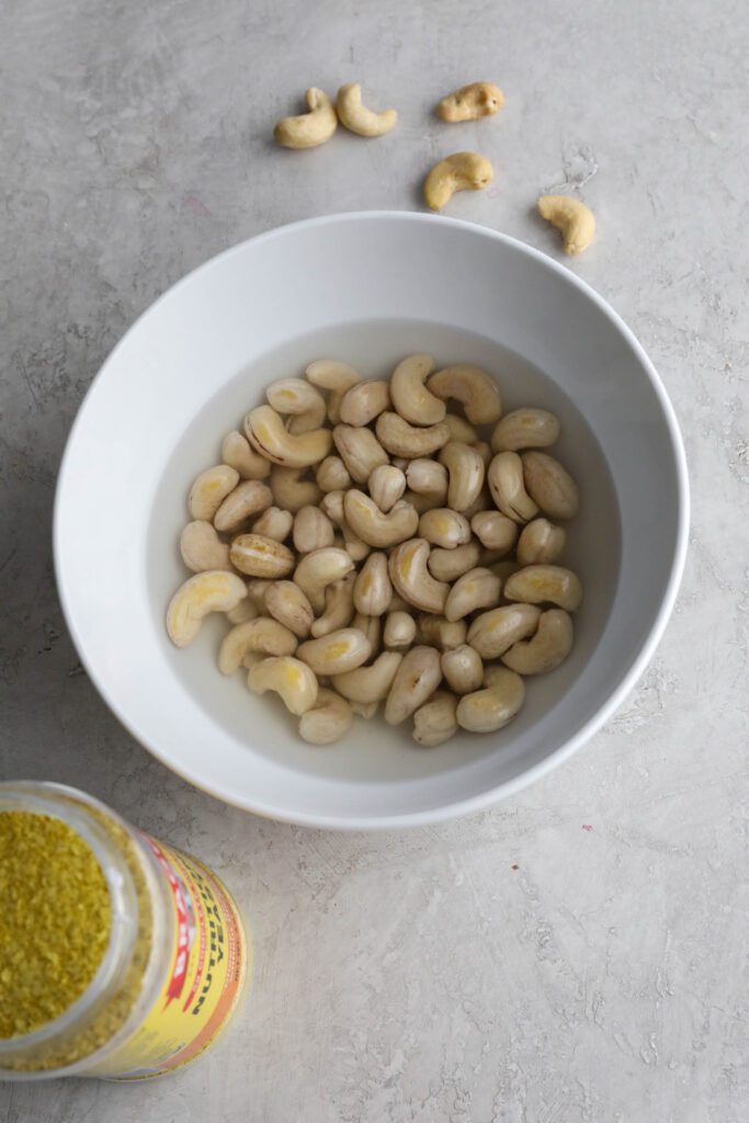 cashews soaking in water in bowl