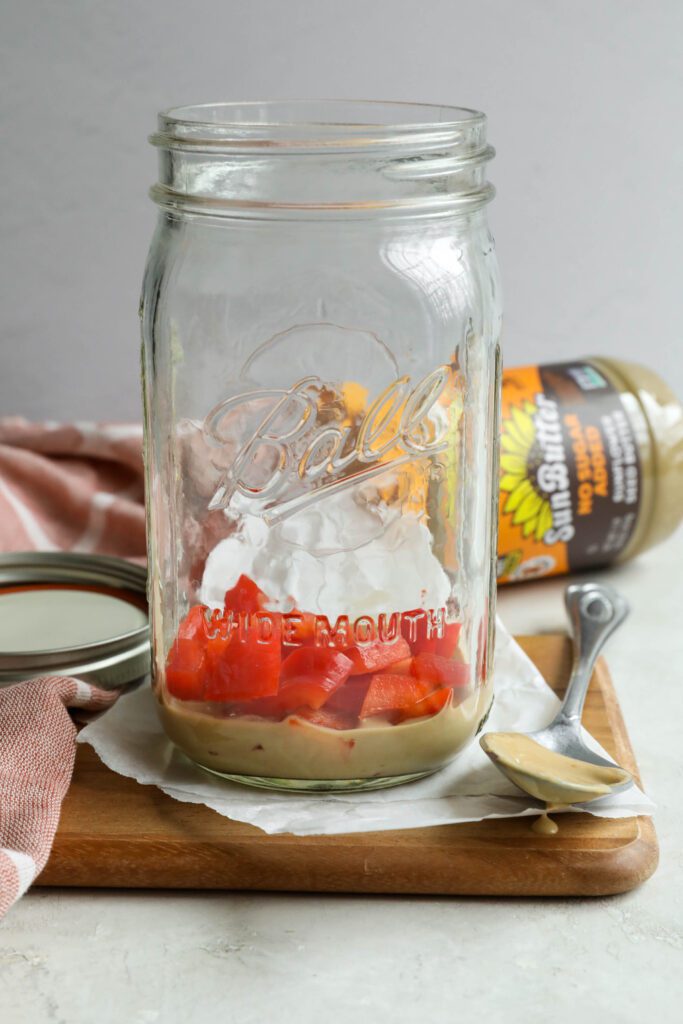 SunButter dressing in jar with bell peppers