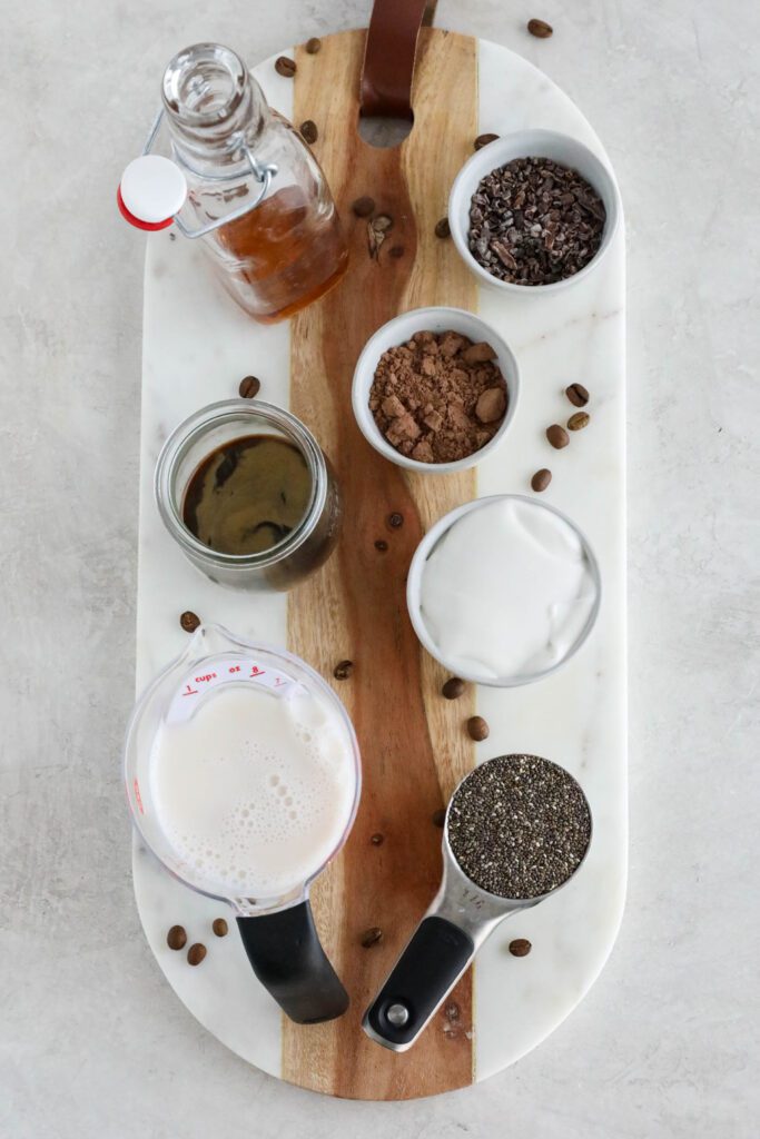 ingredients for tiramisu chia pudding on marble board