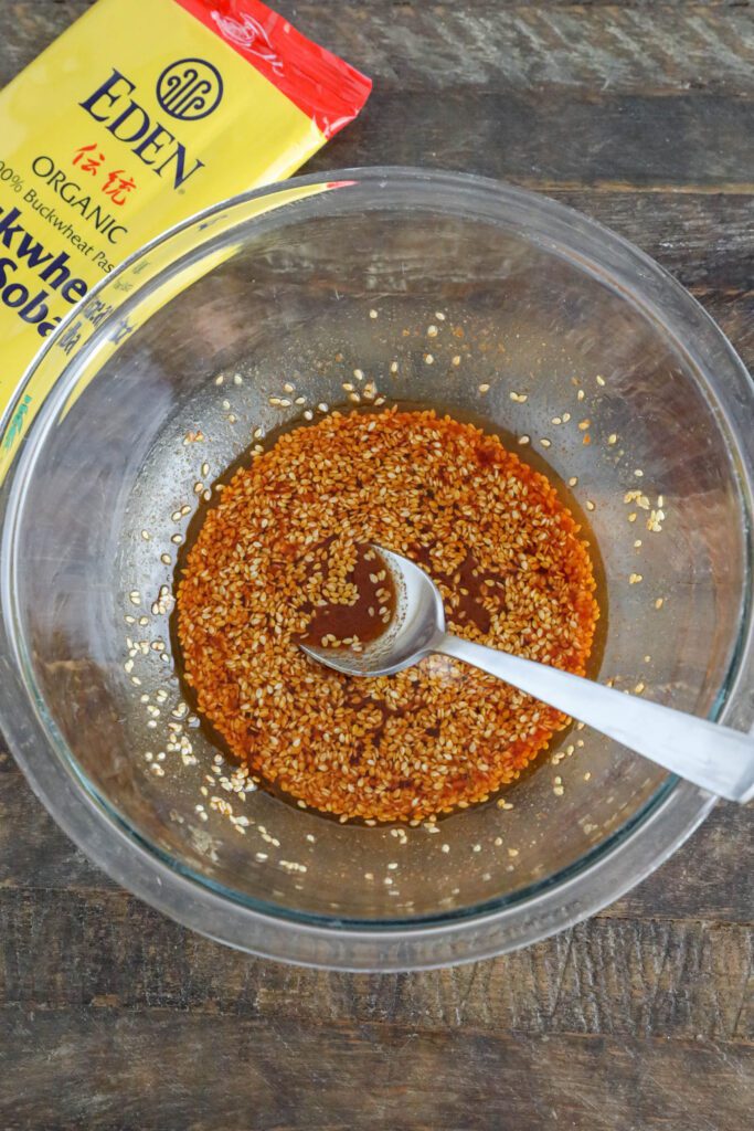 Korean Noodle Bowl sauce mixed in bowl with spoon