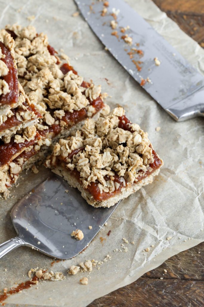 Apple Butter Crumble Bars with spatula 