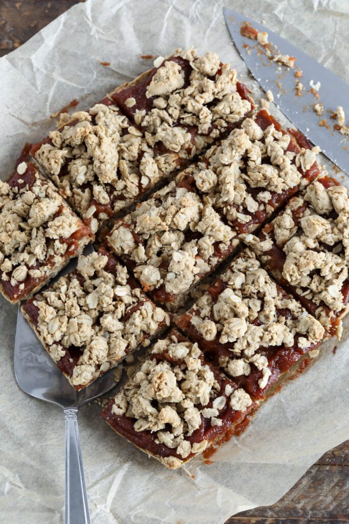 Apple Butter Crumble Bars sliced into 9 squares with knife