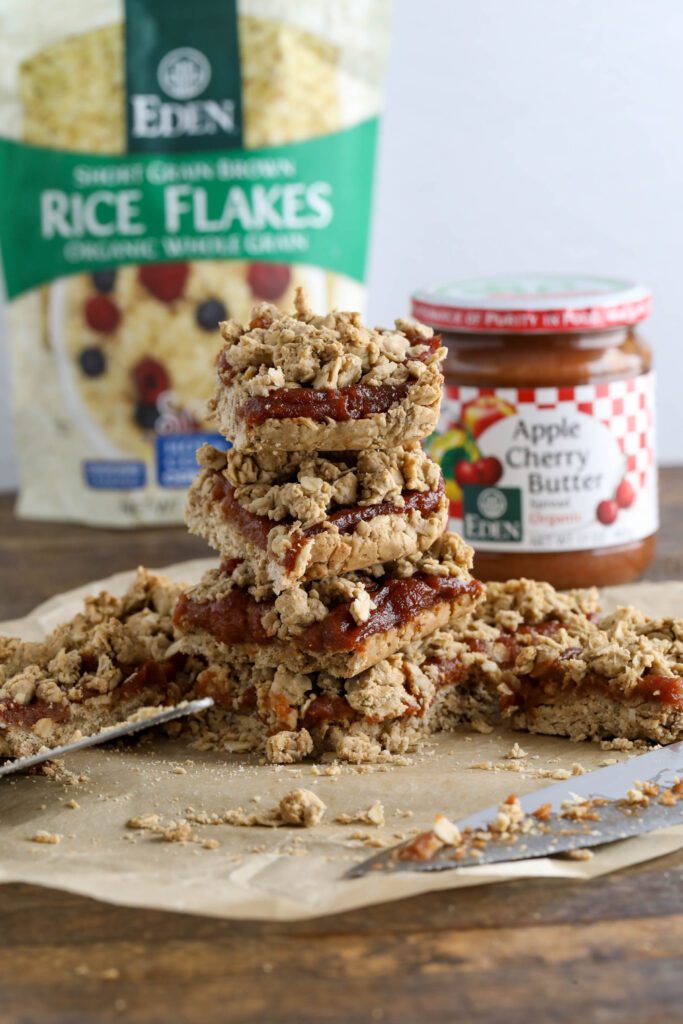 Apple Butter Crumble Bars stacked on parchment paper 