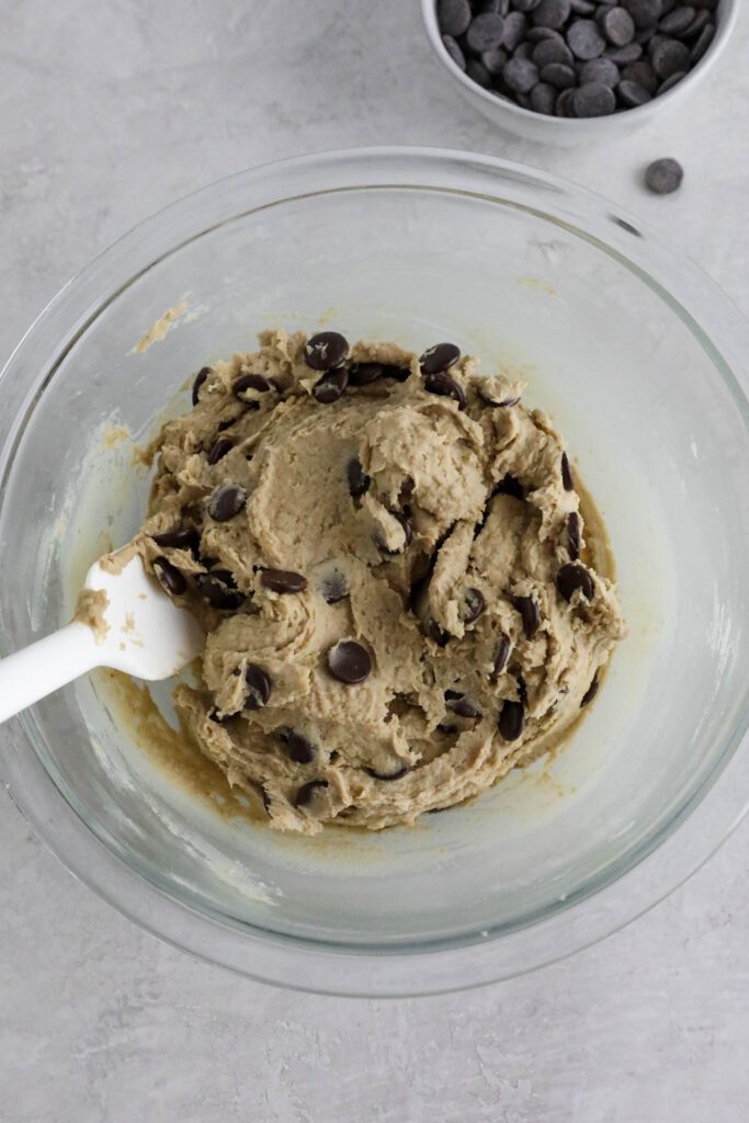 chocolate chip cookie snack batter mixed in bowl
