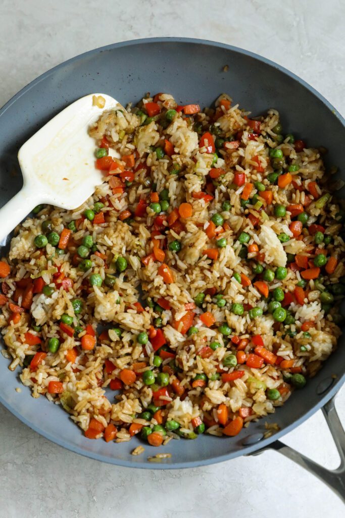 Single Serving Fried Rice in pan with spatula