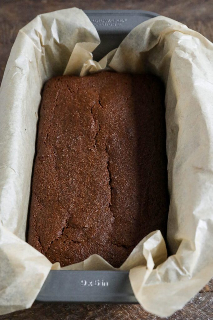 gingerbread loaf baked in parchment lined bread pan