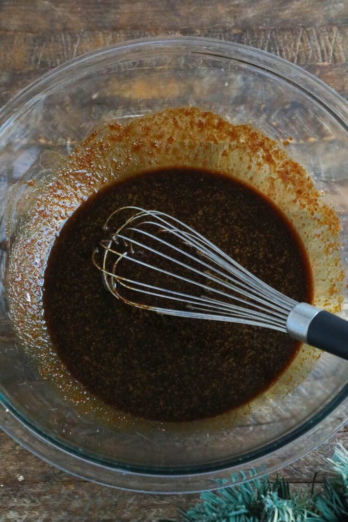 wet ingredients for gingerbread loaf in mixing bowl