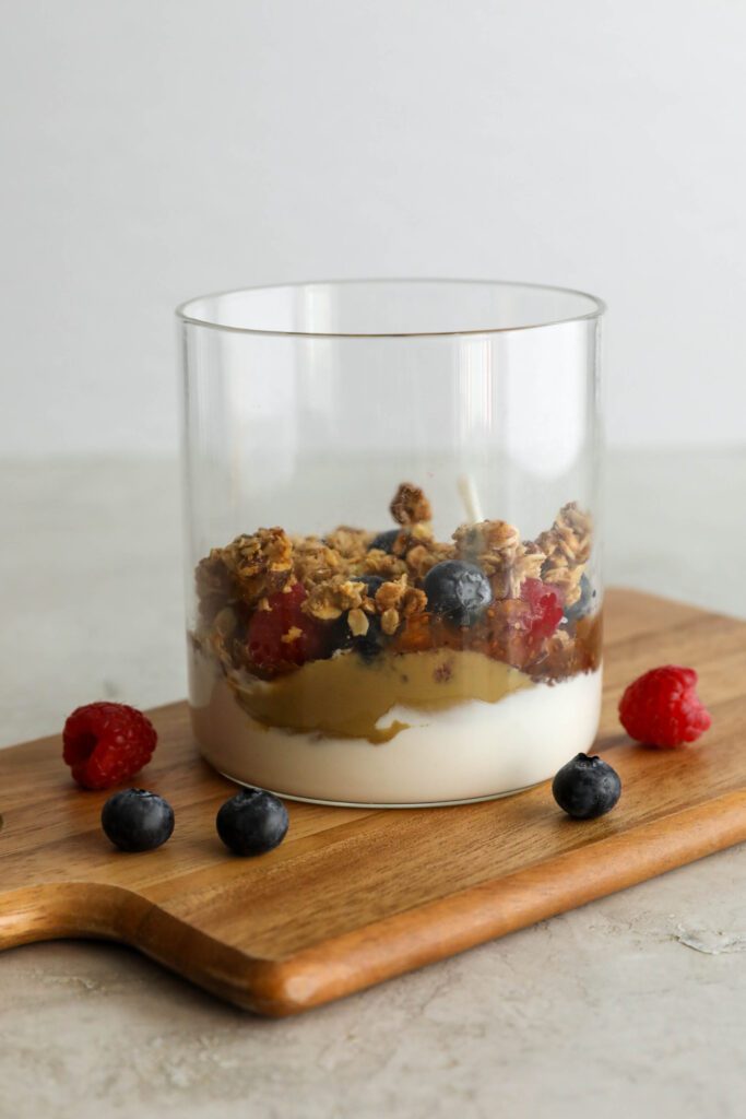 first layers of SunButter Berry Spring Parfait in glass jar